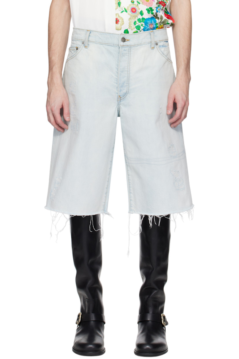 Non-stretch denim shorts. Fading and distressing throughout.

· Belt loops
· Five-pocket styling
· Button fly
· Topstitching at legs
· Frayed edge at cuffs
· Sherpa fleece logo patch at back waistband
· Logo-engraved antiqued silver-tone hardware
· Contrast stitching in tan

Supplier color: Thames wash