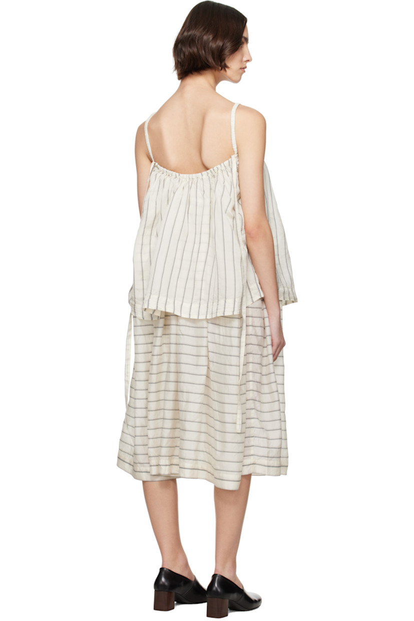 Silk organza midi dress. Stripes throughout

· Layered construction
· Elasticized straight neck
· Gathering at waist
· Seam pockets at waist
· Flared skirt
· Elasticized spaghetti straps
· Self-tie straps at back

Supplier color: Spider stripes as is