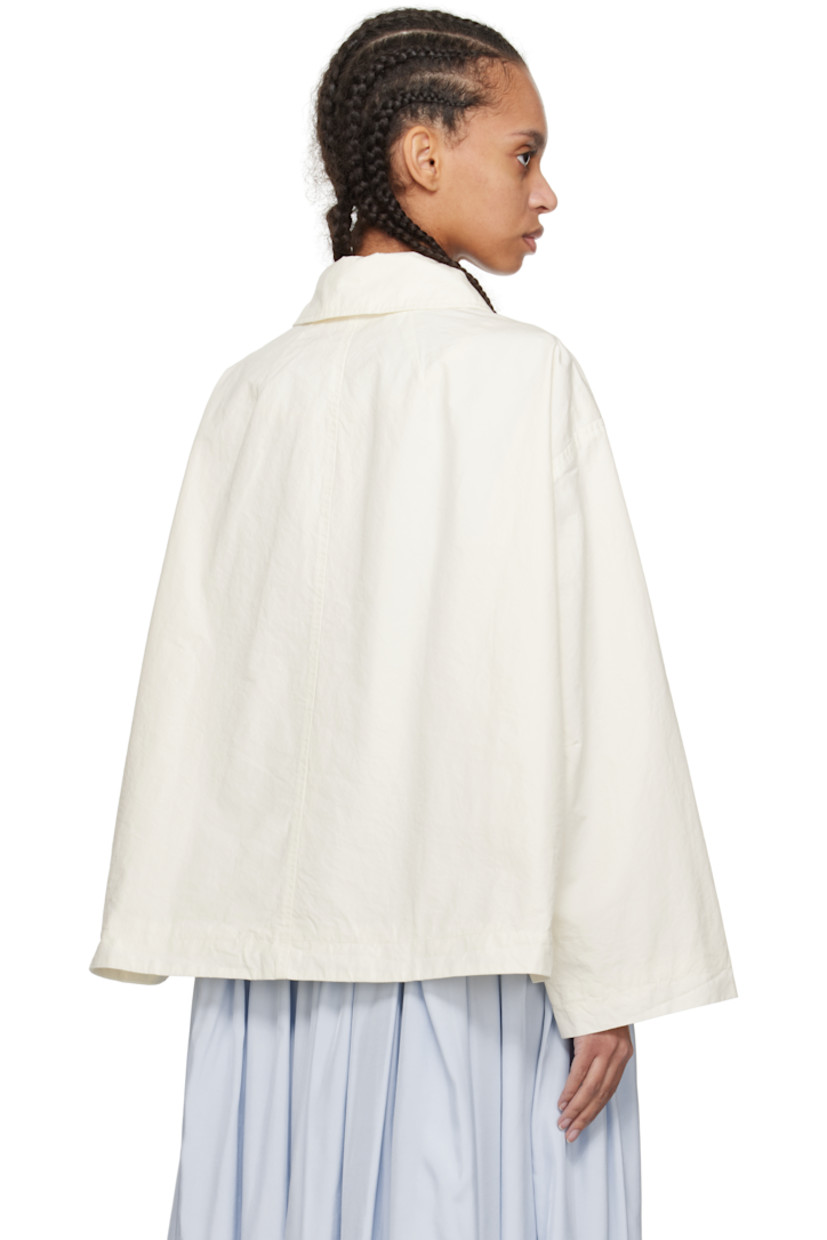 Relaxed-fit textured cotton broadcloth jacket. 

· Garment-washed
· Spread collar
· Button closure
· Welt pockets
· Raglan sleeves
· Darts at back collar
· Full textured poplin lining
· Corozo hardware

Supplier color: Off-white