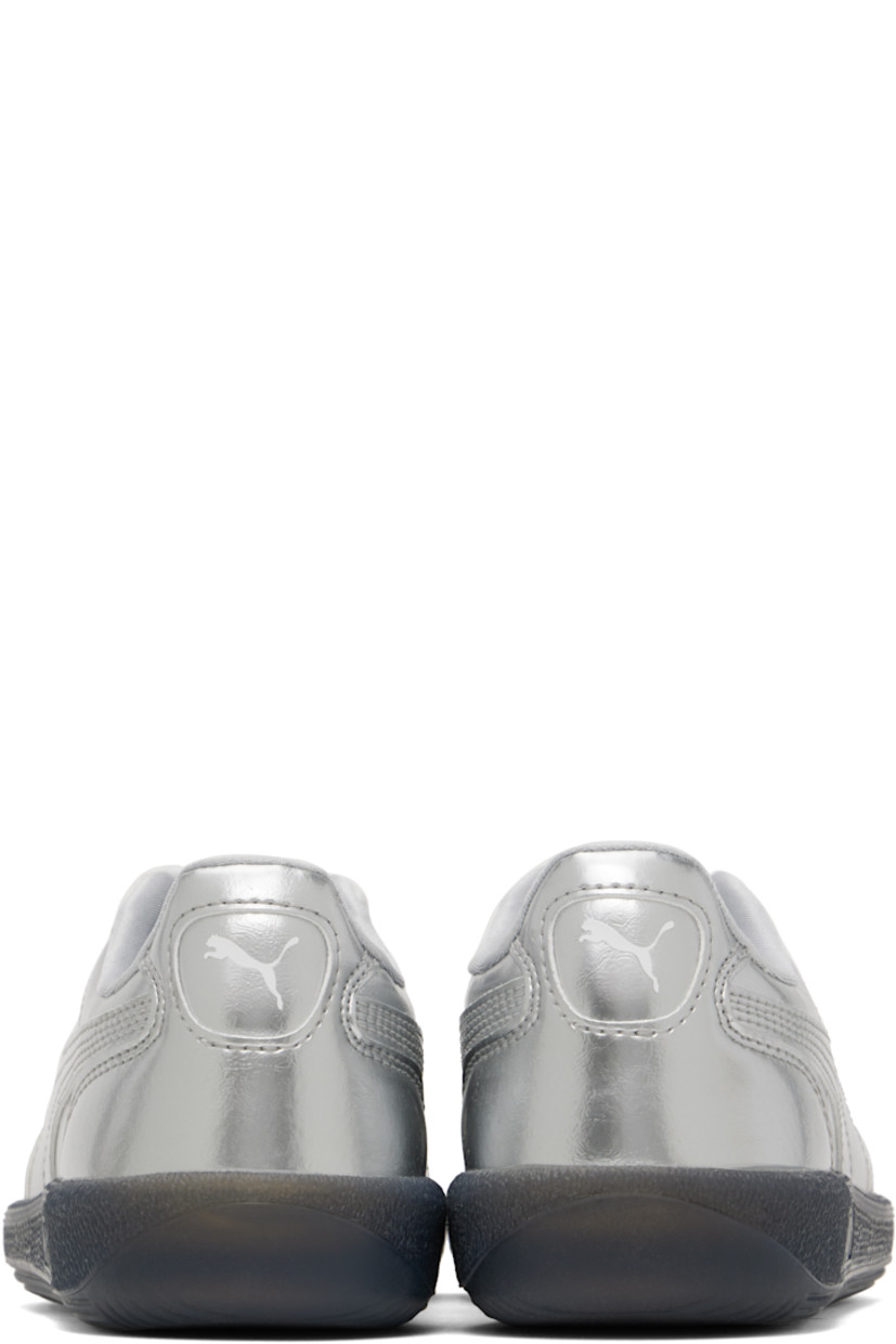 Low-top grained faux-leather sneakers in metallic silver tone.

· Perforations at toe
· Lace-up closure
· Logo embossed at tongue and outer side
· Padded collar
· Formstrip at sides
· Logo printed at heel tab
· Jersey lining
· Logo embossed at textured rubber midsole
· Treaded rubber sole

Supplier color: PUMA silver/PUMA black