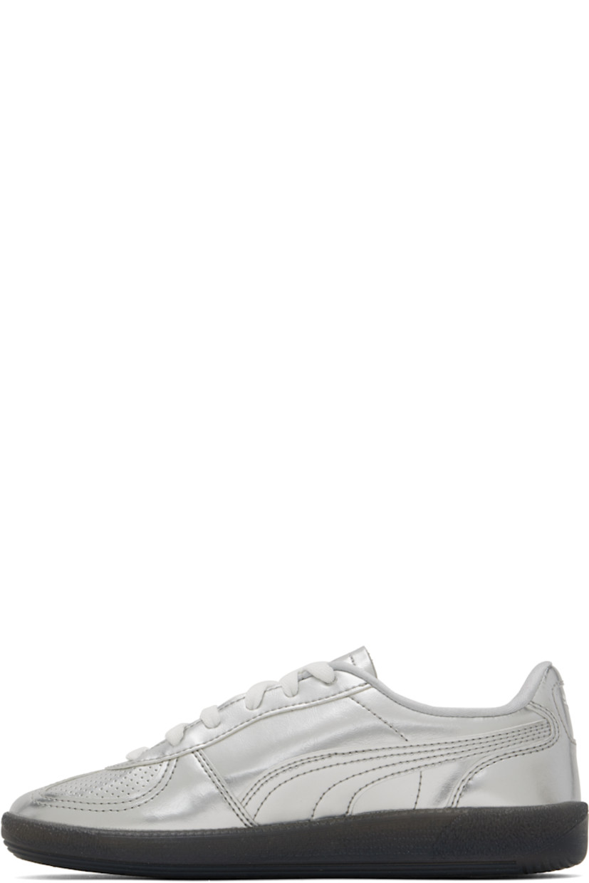 Low-top grained faux-leather sneakers in metallic silver tone.

· Perforations at toe
· Lace-up closure
· Logo embossed at tongue and outer side
· Padded collar
· Formstrip at sides
· Logo printed at heel tab
· Jersey lining
· Logo embossed at textured rubber midsole
· Treaded rubber sole

Supplier color: PUMA silver/PUMA black
