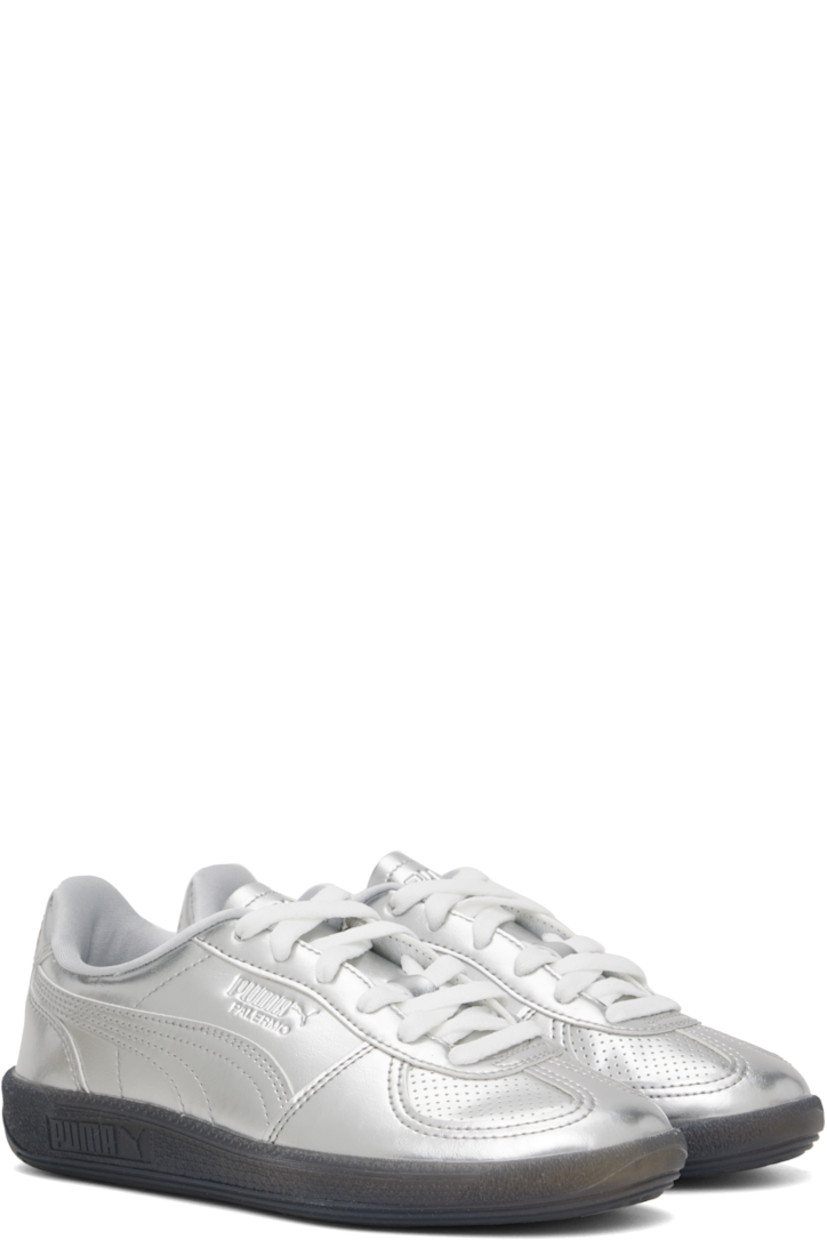 Low-top grained faux-leather sneakers in metallic silver tone.

· Perforations at toe
· Lace-up closure
· Logo embossed at tongue and outer side
· Padded collar
· Formstrip at sides
· Logo printed at heel tab
· Jersey lining
· Logo embossed at textured rubber midsole
· Treaded rubber sole

Supplier color: PUMA silver/PUMA black