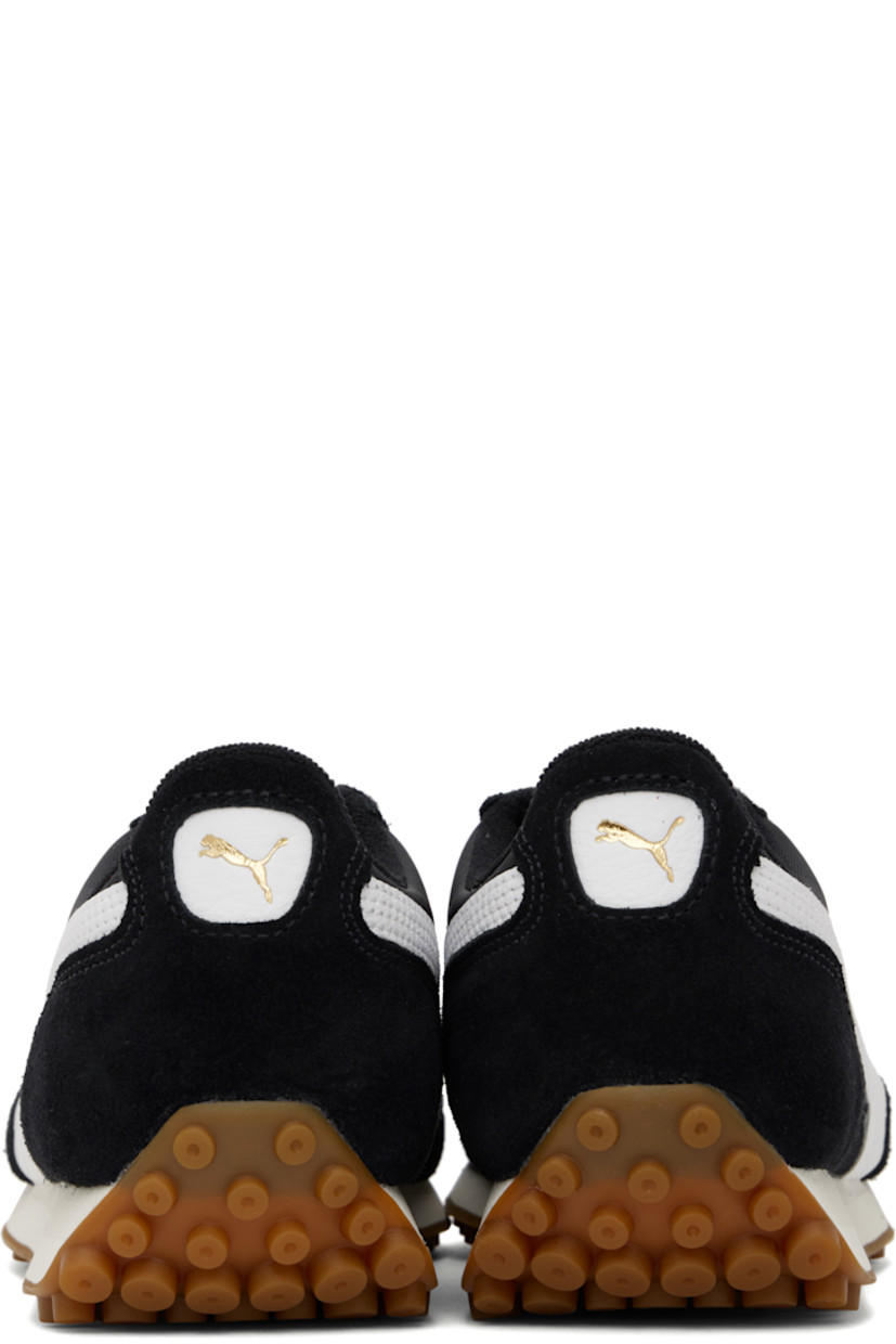 Low-top paneled canvas and LWG-certified suede sneakers in black and white.

· Lace-up closure
· Logo patch at tongue
· Padded collar
· Buffed leather Formstrip at sides
· Logo stamp at outer side and heel tab 
· Terrycloth lining
· Foam rubber midsole
· Treaded rubber sole

Supplier color: Puma black/Puma white