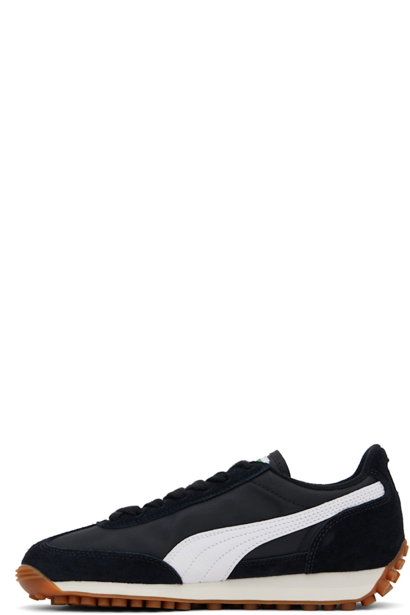 Low-top paneled canvas and LWG-certified suede sneakers in black and white.

· Lace-up closure
· Logo patch at tongue
· Padded collar
· Buffed leather Formstrip at sides
· Logo stamp at outer side and heel tab 
· Terrycloth lining
· Foam rubber midsole
· Treaded rubber sole

Supplier color: Puma black/Puma white