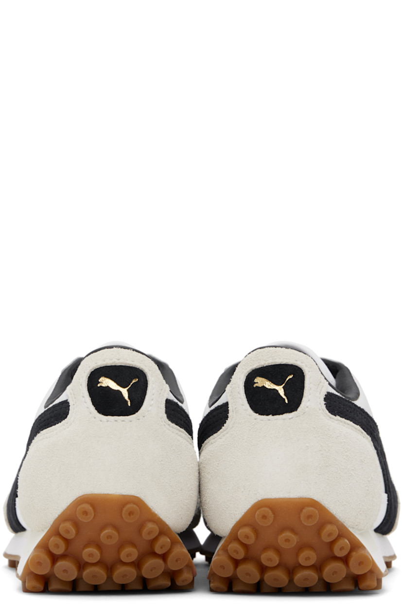 Low-top LWG-certified grained leather sneakers in white and black.

· Faux-suede trim at toe and heel
· Lace-up closure
· Logo embossed at tongue
· Padded collar
· Suede Formstrip at sides
· Logo stamp at outer side and heel tab
· Faux-leather lining
· Foam rubber midsole
· Treaded rubber sole

Supplier color: PUMA white/PUMA black