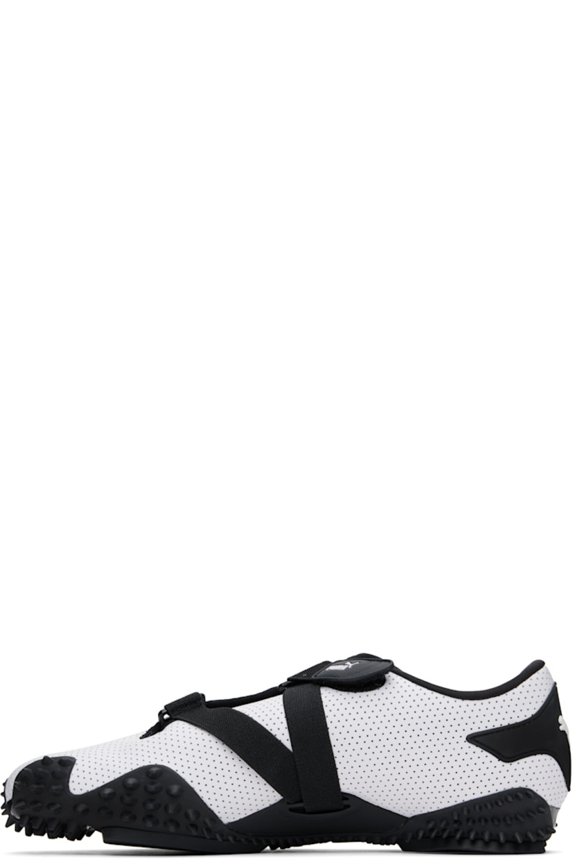 Low-top buffed leather sneakers in white. 

· Perforations throughout
· Offset velcro straps at vamp
· Logo patch at vamp and padded tongue
· Concealed elasticized gusset at tongue
· Padded collar
· Quilted formstrip at outer side
· Rubberized logo patch at heel counter
· Jersey lining
· Spikes at rubber midsole
· Treaded rubber sole

Supplier color: PUMA white/PUMA black