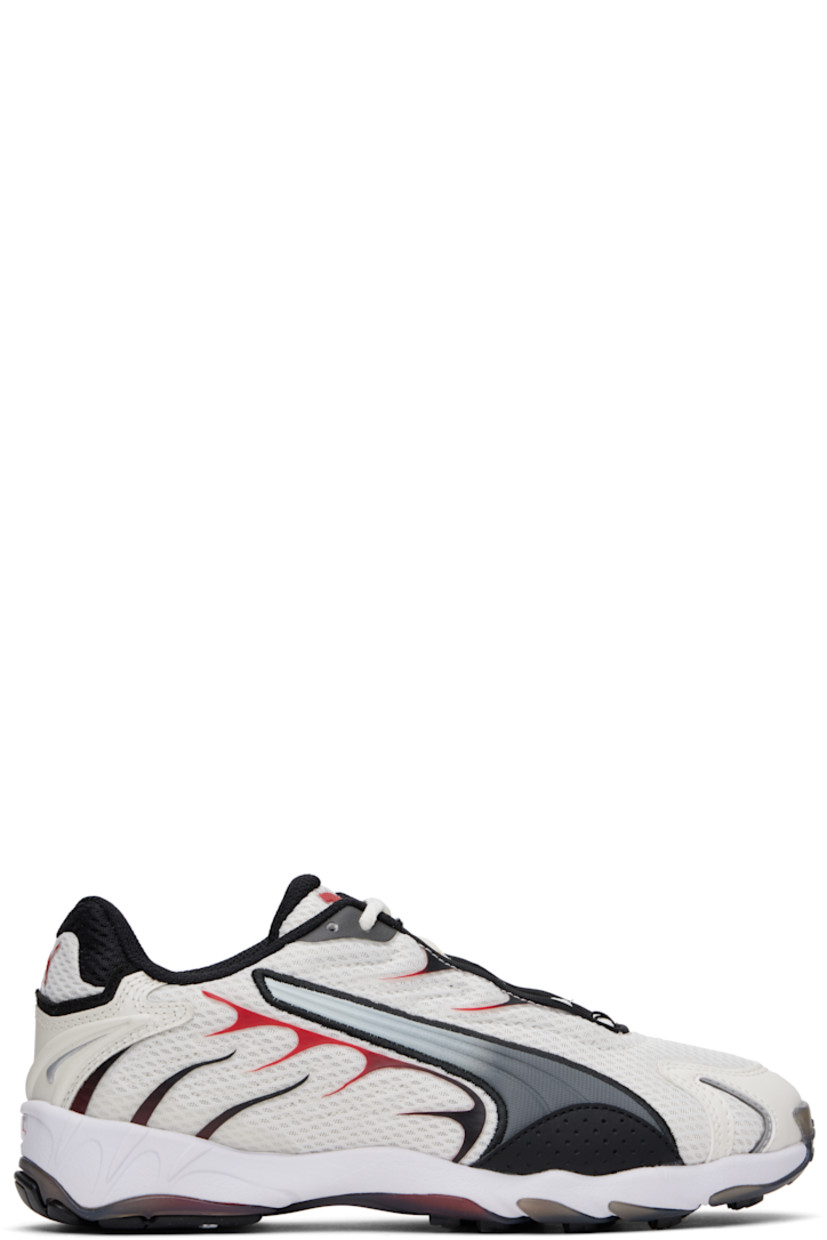 Low-top mesh sneakers in off-white and red. Rubber trim, faux-leather appliqués, and reflective detailing throughout.

· Lace-up closure
· Logo bonded at tongue and heel
· Padded tongue and collar
· Quilted faux-leather stripe at sides
· Perforations at sides
· Cushioned Ortholite™ insole
· Mesh lining
· Treaded rubber sole

Part of the PUMA x A$AP Rocky collaboration.

Supplier color: Warm white/For all time red