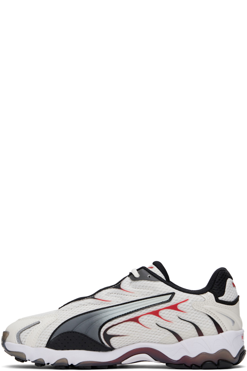 Low-top mesh sneakers in off-white and red. Rubber trim, faux-leather appliqués, and reflective detailing throughout.

· Lace-up closure
· Logo bonded at tongue and heel
· Padded tongue and collar
· Quilted faux-leather stripe at sides
· Perforations at sides
· Cushioned Ortholite™ insole
· Mesh lining
· Treaded rubber sole

Part of the PUMA x A$AP Rocky collaboration.

Supplier color: Warm white/For all time red