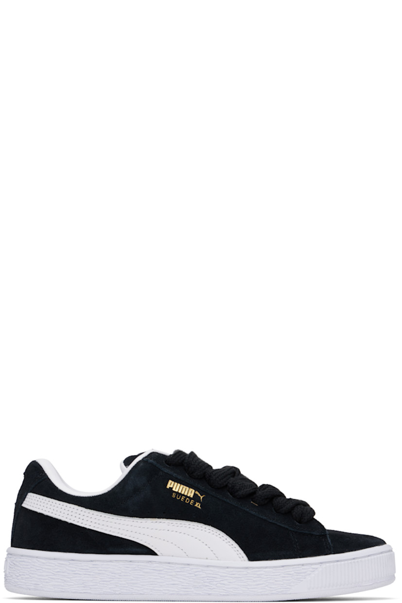Low-top LWG-certified suede sneakers in black and white.

· Lace-up closure
· Rubber logo patch at padded tongue
· Padded collar
· Logo stamp at outer side and heel tab
· Formstrip and perforations at sides
· Buffed faux-leather lining
· Logo embossed at textured rubber midsole
· Treaded rubber sole

Supplier color: PUMA black/PUMA white