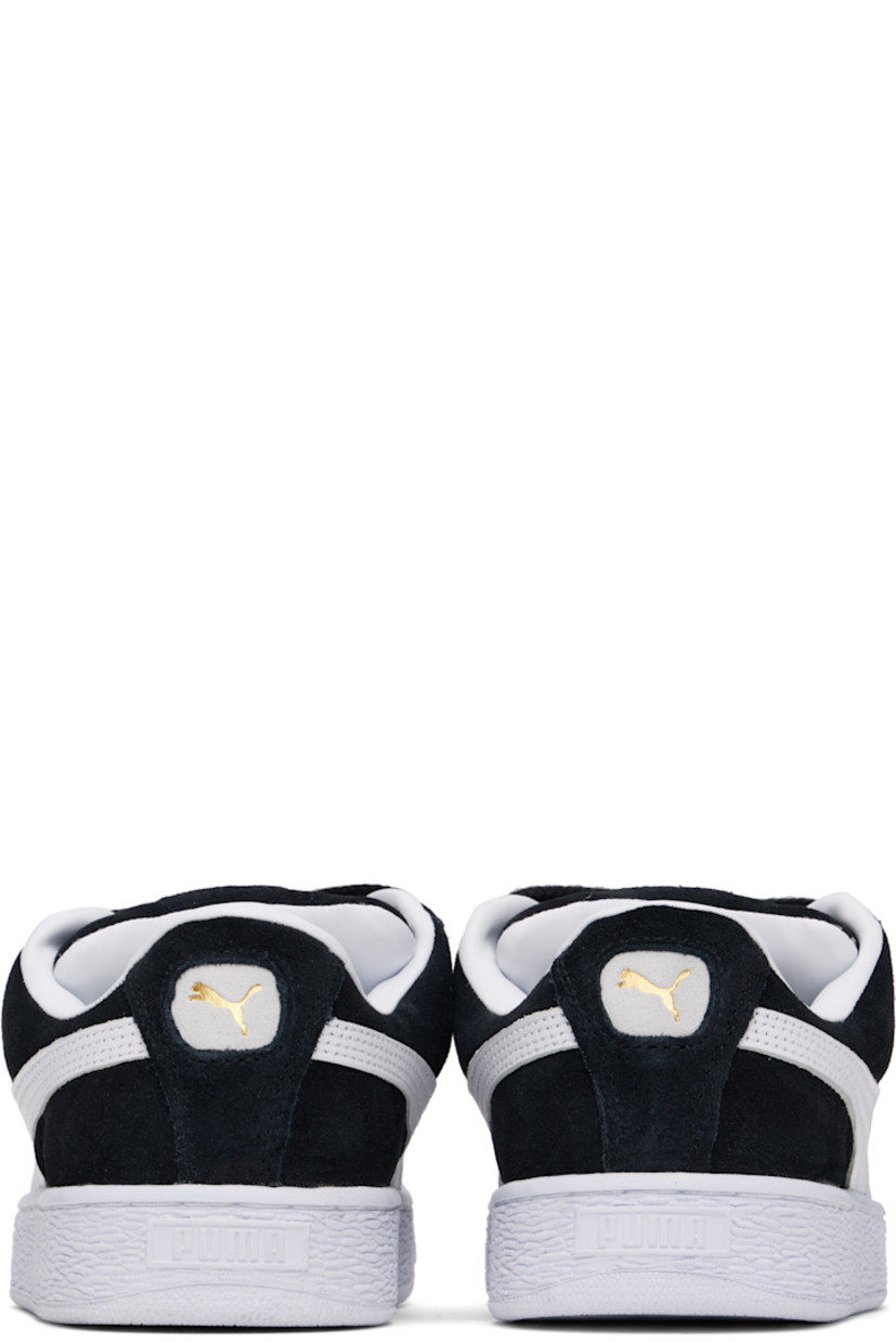 Low-top LWG-certified suede sneakers in black and white.

· Lace-up closure
· Rubber logo patch at padded tongue
· Padded collar
· Logo stamp at outer side and heel tab
· Formstrip and perforations at sides
· Buffed faux-leather lining
· Logo embossed at textured rubber midsole
· Treaded rubber sole

Supplier color: PUMA black/PUMA white
