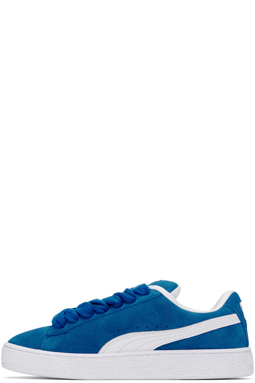 Low-top LWG-certified suede sneakers in blue and white.

· Lace-up closure
· Rubber logo patch at padded tongue
· Padded collar
· Logo stamp at outer side and heel tab
· Formstrip and perforations at sides
· Buffed faux-leather lining
· Logo embossed at textured rubber midsole
· Treaded rubber sole

Supplier color: PUMA team royal/PUMA white