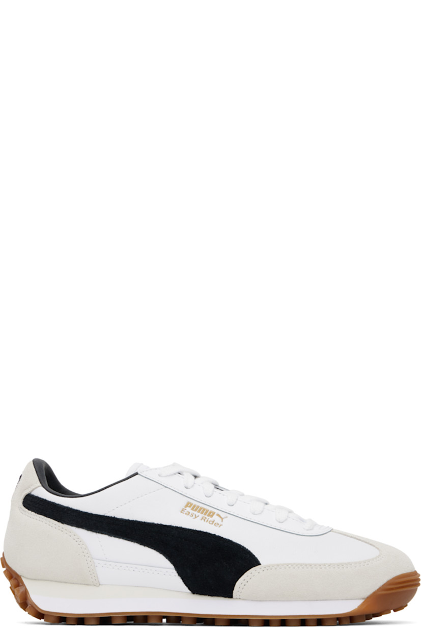 Low-top LWG-certified grained leather sneakers in white.

· Faux-suede trim at toe and heel
· Lace-up closure
· Logo embossed at tongue
· Padded collar
· Suede Formstrip at sides
· Logo stamp at outer side and heel tab
· Faux-leather lining
· Treaded rubber sole

Supplier color: PUMA white/PUMA black