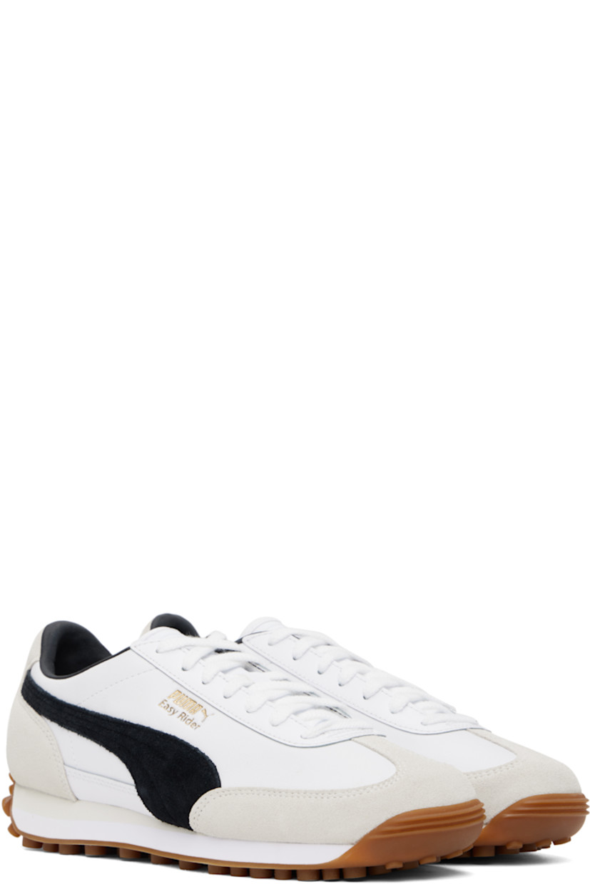 Low-top LWG-certified grained leather sneakers in white.

· Faux-suede trim at toe and heel
· Lace-up closure
· Logo embossed at tongue
· Padded collar
· Suede Formstrip at sides
· Logo stamp at outer side and heel tab
· Faux-leather lining
· Treaded rubber sole

Supplier color: PUMA white/PUMA black