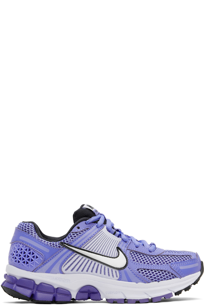 Low-top mesh and buffed faux-leather sneakers in blue.

· Reflective trim throughout
· Lace-up closure
· Logo patch at padded tongue
· Padded collar
· Rubberized overlay at sides and heel
· Swoosh appliqué at sides
· Reflective swoosh printed at heel tab
· Mesh lining
· Zoom Air unit at foam rubber midsole
· Treaded rubber sole

Please note that this item may only be shipped within North America.

Supplier color: Royal pulse/Football grey/Persian violet/Metallic platinum