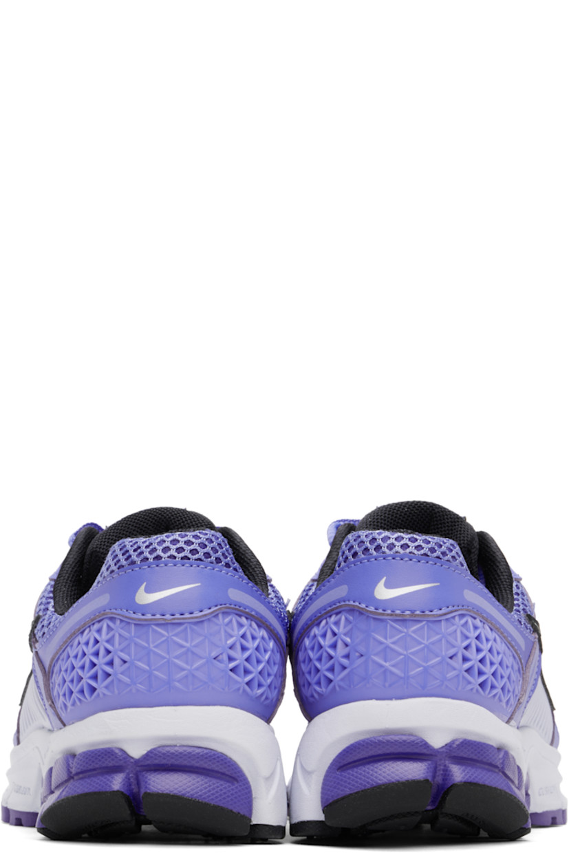 Low-top mesh and buffed faux-leather sneakers in blue.

· Reflective trim throughout
· Lace-up closure
· Logo patch at padded tongue
· Padded collar
· Rubberized overlay at sides and heel
· Swoosh appliqué at sides
· Reflective swoosh printed at heel tab
· Mesh lining
· Zoom Air unit at foam rubber midsole
· Treaded rubber sole

Please note that this item may only be shipped within North America.

Supplier color: Royal pulse/Football grey/Persian violet/Metallic platinum
