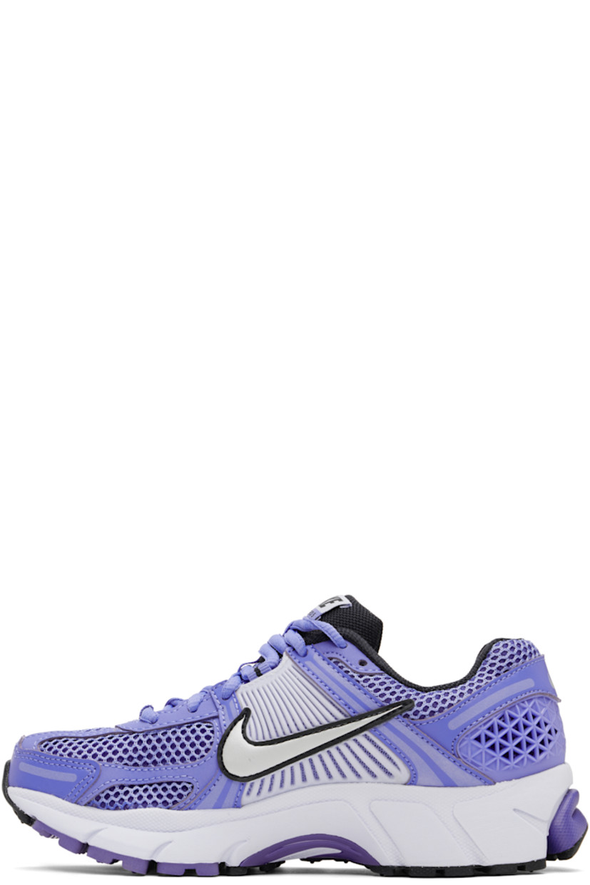 Low-top mesh and buffed faux-leather sneakers in blue.

· Reflective trim throughout
· Lace-up closure
· Logo patch at padded tongue
· Padded collar
· Rubberized overlay at sides and heel
· Swoosh appliqué at sides
· Reflective swoosh printed at heel tab
· Mesh lining
· Zoom Air unit at foam rubber midsole
· Treaded rubber sole

Please note that this item may only be shipped within North America.

Supplier color: Royal pulse/Football grey/Persian violet/Metallic platinum