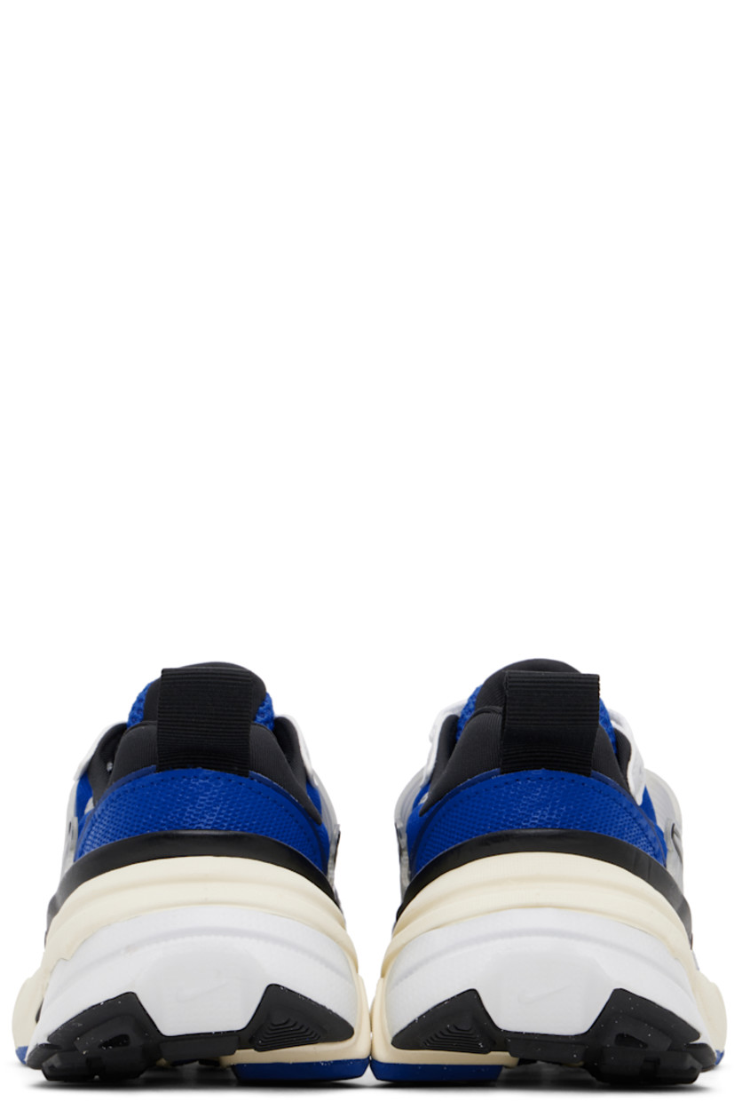 Low-top mesh sneakers in blue.

· Reflective trim throughout
· Lace-up closure
· Logo patch at padded tongue
· Padded collar
· Rubber overlay at sides
· Swoosh appliqué at sides
· Pull-loop at heel tab
· Jersey lining
· Foam rubber midsole
· Treaded rubber sole

Please note that this item may be shipped only within North America.

Supplier color: Game royal/Metallic silver