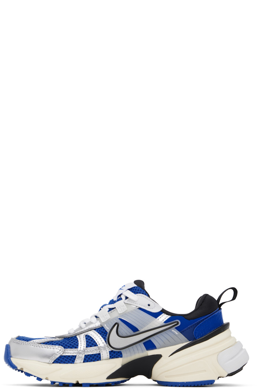 Low-top mesh sneakers in blue.

· Reflective trim throughout
· Lace-up closure
· Logo patch at padded tongue
· Padded collar
· Rubber overlay at sides
· Swoosh appliqué at sides
· Pull-loop at heel tab
· Jersey lining
· Foam rubber midsole
· Treaded rubber sole

Please note that this item may be shipped only within North America.

Supplier color: Game royal/Metallic silver