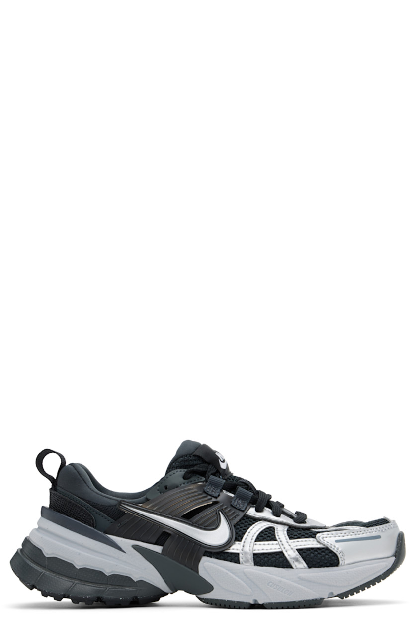 Low-top mesh and faux-leather sneakers in black and metallic silver tone.

· Lace-up closure
· Logo patch at padded tongue
· Padded collar
· Rubber overlay at sides
· Swoosh appliqué at sides
· Pull-loop at heel tab
· Jersey lining
· Foam rubber midsole
· Treaded rubber sole

Please note that this item may be shipped only within North America.

Supplier color: Black/Anthracite/Dark smoke grey/Metallic silver