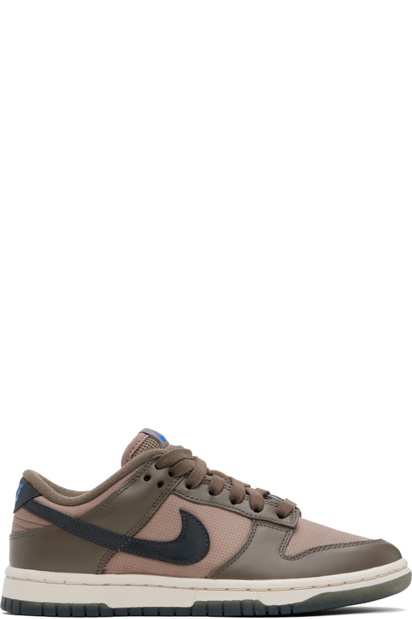 Low-top buffed leather and ripstop sneakers in brown.

· Lace-up closure
· Logo patch at padded tongue
· Padded collar
· Swoosh appliqué at sides
· Logo printed at heel tab
· Terrycloth lining
· Treaded rubber sole

Please note that this item may be shipped only within North America.

Supplier color:  Ironstone/Mink brown/Racer blue/Anthracite