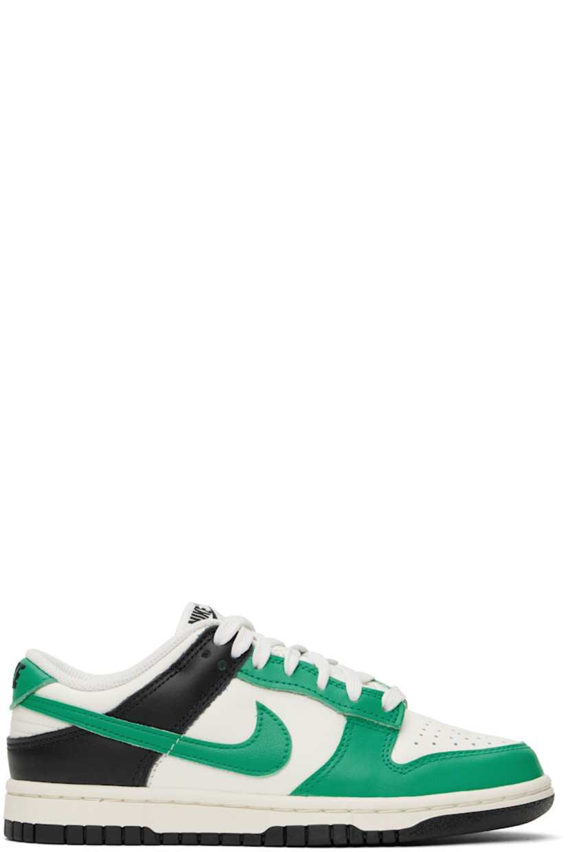 Low-top buffed leather sneakers in green, white, and black.

· Perforations at toe
· Lace-up closure
· Logo patch at padded tongue
· Padded collar
· Swoosh appliqué at sides
· Logo embroidered at heel tab
· Mesh lining
· Foam rubber midsole
· Treaded rubber sole

Please note that this item may be shipped only within North America.

Supplier color: Sail/Stadium green/Black