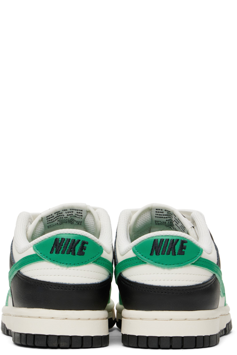 Low-top buffed leather sneakers in green, white, and black.

· Perforations at toe
· Lace-up closure
· Logo patch at padded tongue
· Padded collar
· Swoosh appliqué at sides
· Logo embroidered at heel tab
· Mesh lining
· Foam rubber midsole
· Treaded rubber sole

Please note that this item may be shipped only within North America.

Supplier color: Sail/Stadium green/Black