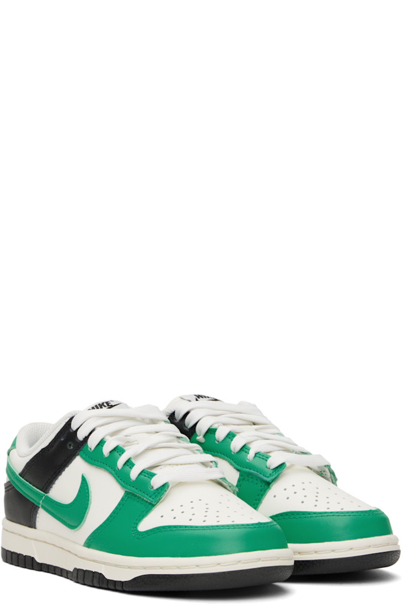 Low-top buffed leather sneakers in green, white, and black.

· Perforations at toe
· Lace-up closure
· Logo patch at padded tongue
· Padded collar
· Swoosh appliqué at sides
· Logo embroidered at heel tab
· Mesh lining
· Foam rubber midsole
· Treaded rubber sole

Please note that this item may be shipped only within North America.

Supplier color: Sail/Stadium green/Black
