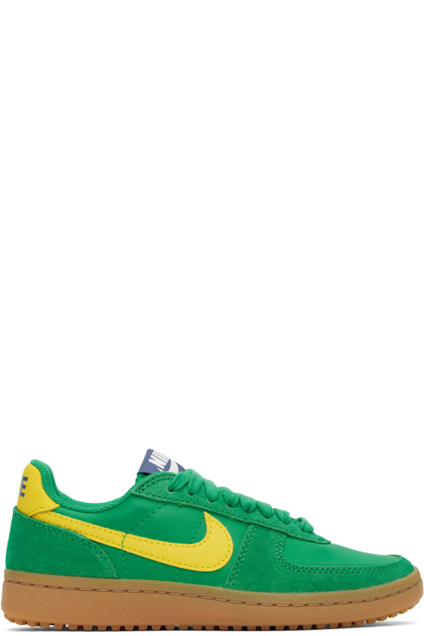 Low-top buffed leather and suede sneakers in green and yellow.

· Lace-up closure
· Logo patch at padded tongue
· Padded collar
· Swoosh appliqué at sides
· Logo printed at heel tab
· Foam rubber midsole
· Treaded rubber sole

Please note that this item may be shipped only within North America.

Supplier color: Stadium green/Sail/Diffused blue/Lightning