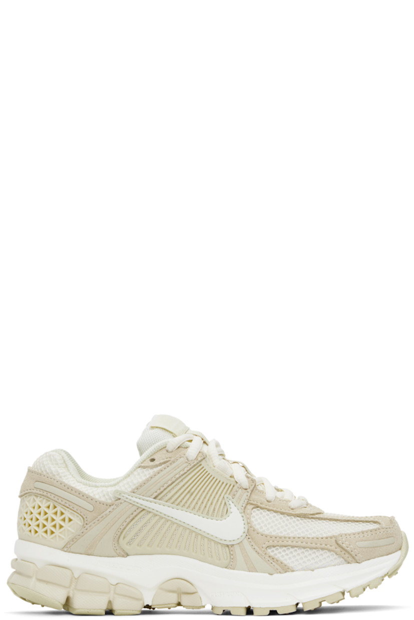 Low-top mesh, suede, and buffed faux-leather sneakers in off-white and beige.

· Reflective trim throughout
· Lace-up closure
· Logo patch at padded tongue
· Padded collar
· Rubberized overlay at sides and heel
· Swoosh appliqué at sides
· Swoosh printed at heel tab
· Mesh lining
· Zoom Air cushioning at foam rubber midsole
· Treaded rubber sole

Please note that this item may be shipped only within North America.

Supplier color: Beach/Light khaki/Pale ivory/Sail