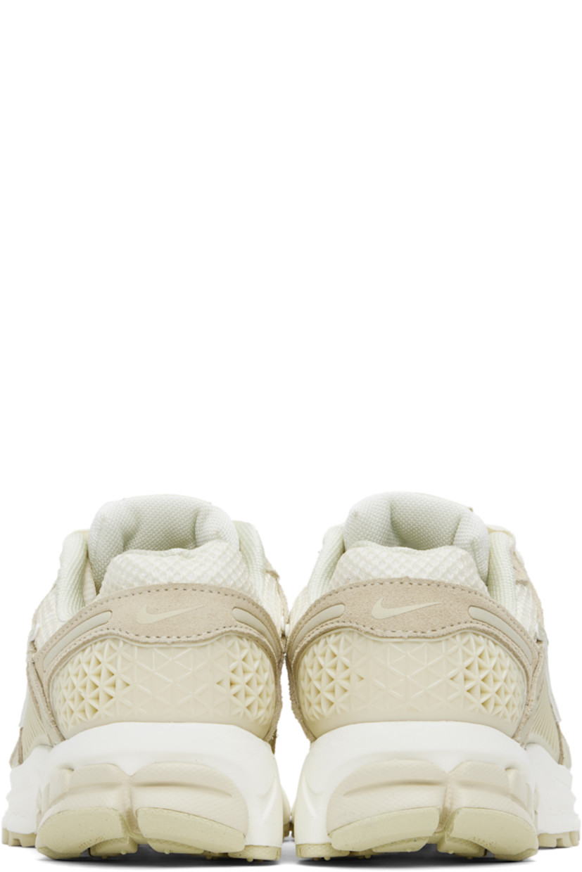Low-top mesh, suede, and buffed faux-leather sneakers in off-white and beige.

· Reflective trim throughout
· Lace-up closure
· Logo patch at padded tongue
· Padded collar
· Rubberized overlay at sides and heel
· Swoosh appliqué at sides
· Swoosh printed at heel tab
· Mesh lining
· Zoom Air cushioning at foam rubber midsole
· Treaded rubber sole

Please note that this item may be shipped only within North America.

Supplier color: Beach/Light khaki/Pale ivory/Sail