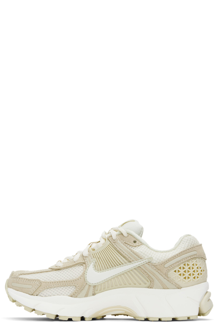 Low-top mesh, suede, and buffed faux-leather sneakers in off-white and beige.

· Reflective trim throughout
· Lace-up closure
· Logo patch at padded tongue
· Padded collar
· Rubberized overlay at sides and heel
· Swoosh appliqué at sides
· Swoosh printed at heel tab
· Mesh lining
· Zoom Air cushioning at foam rubber midsole
· Treaded rubber sole

Please note that this item may be shipped only within North America.

Supplier color: Beach/Light khaki/Pale ivory/Sail