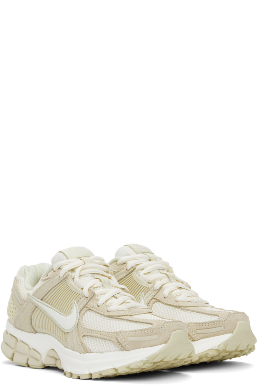 Low-top mesh, suede, and buffed faux-leather sneakers in off-white and beige.

· Reflective trim throughout
· Lace-up closure
· Logo patch at padded tongue
· Padded collar
· Rubberized overlay at sides and heel
· Swoosh appliqué at sides
· Swoosh printed at heel tab
· Mesh lining
· Zoom Air cushioning at foam rubber midsole
· Treaded rubber sole

Please note that this item may be shipped only within North America.

Supplier color: Beach/Light khaki/Pale ivory/Sail