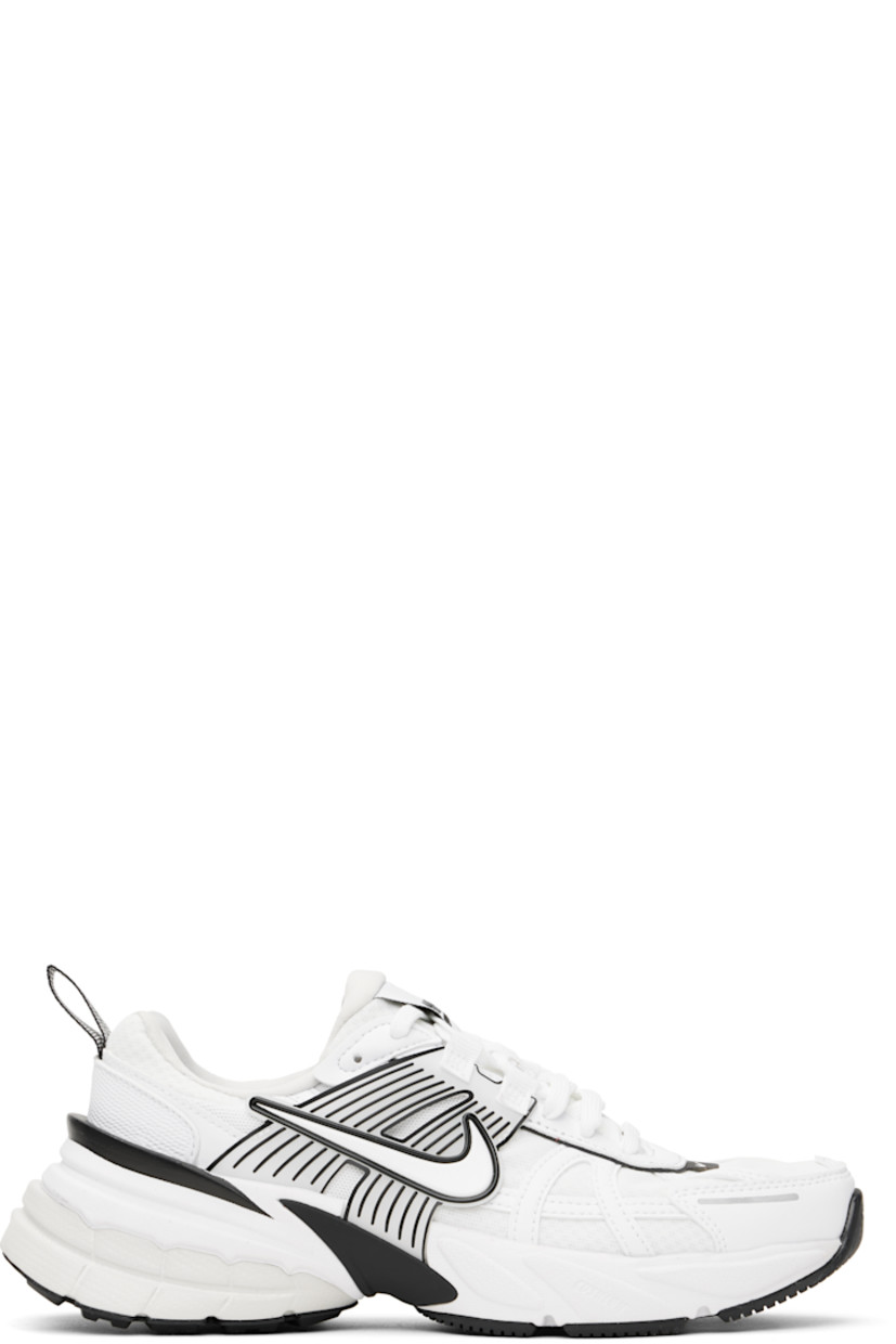Low-top mesh and faux-leather sneakers in white.

· Swoosh printed at lace-up closure
· Logo patch at padded tongue
· Padded collar
· Swoosh and transparent rubber overlay at sides
· Reflective trim at outer side
· Reflective pull-loop at heel
· Cushlon foam rubber midsole
· Treaded rubber sole

Please note that this item may be shipped only within North America.

Supplier color: White/Platinum Tint/Summit White/White