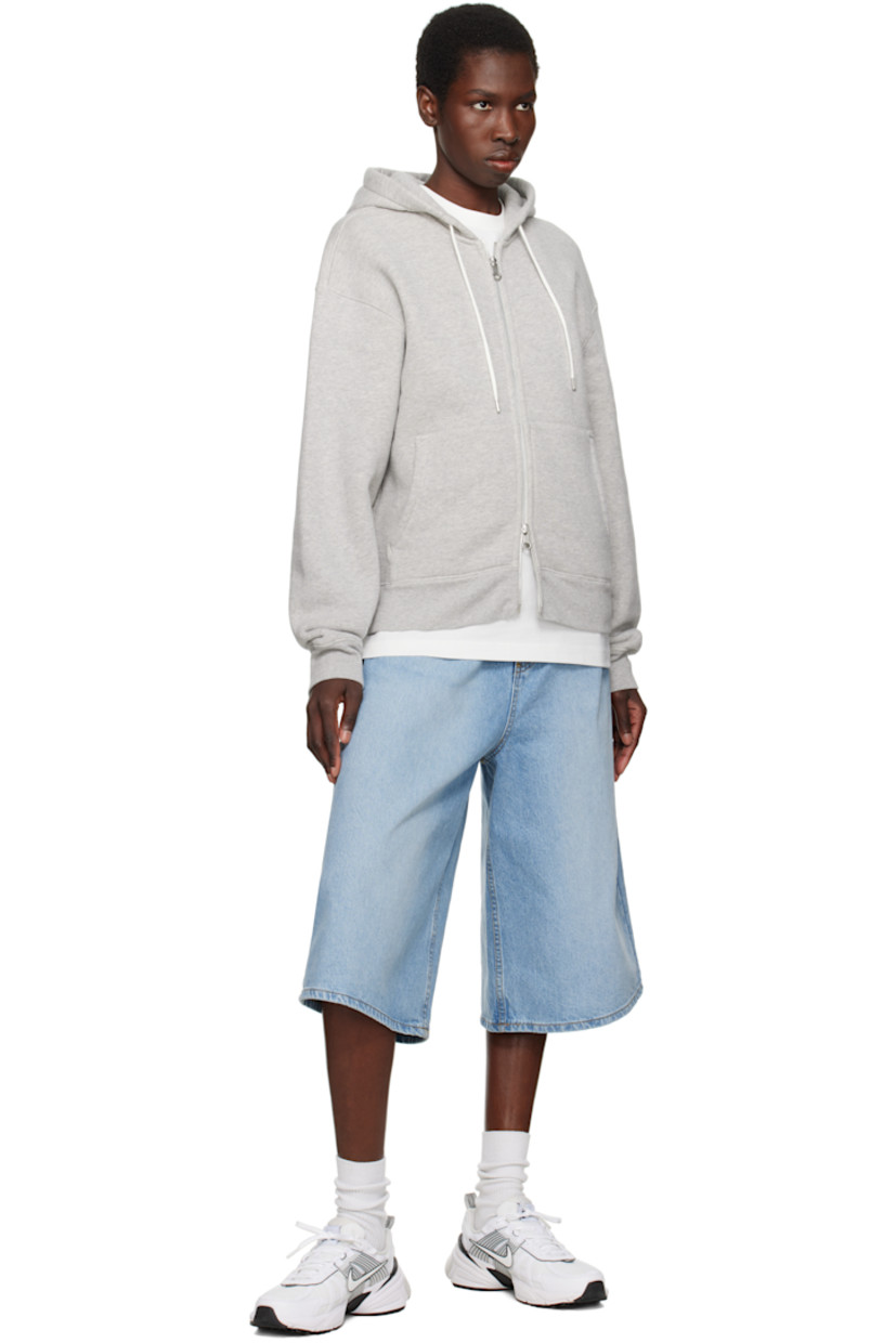 Low-top mesh and faux-leather sneakers in white.

· Swoosh printed at lace-up closure
· Logo patch at padded tongue
· Padded collar
· Swoosh and transparent rubber overlay at sides
· Reflective trim at outer side
· Reflective pull-loop at heel
· Cushlon foam rubber midsole
· Treaded rubber sole

Please note that this item may be shipped only within North America.

Supplier color: White/Platinum Tint/Summit White/White
