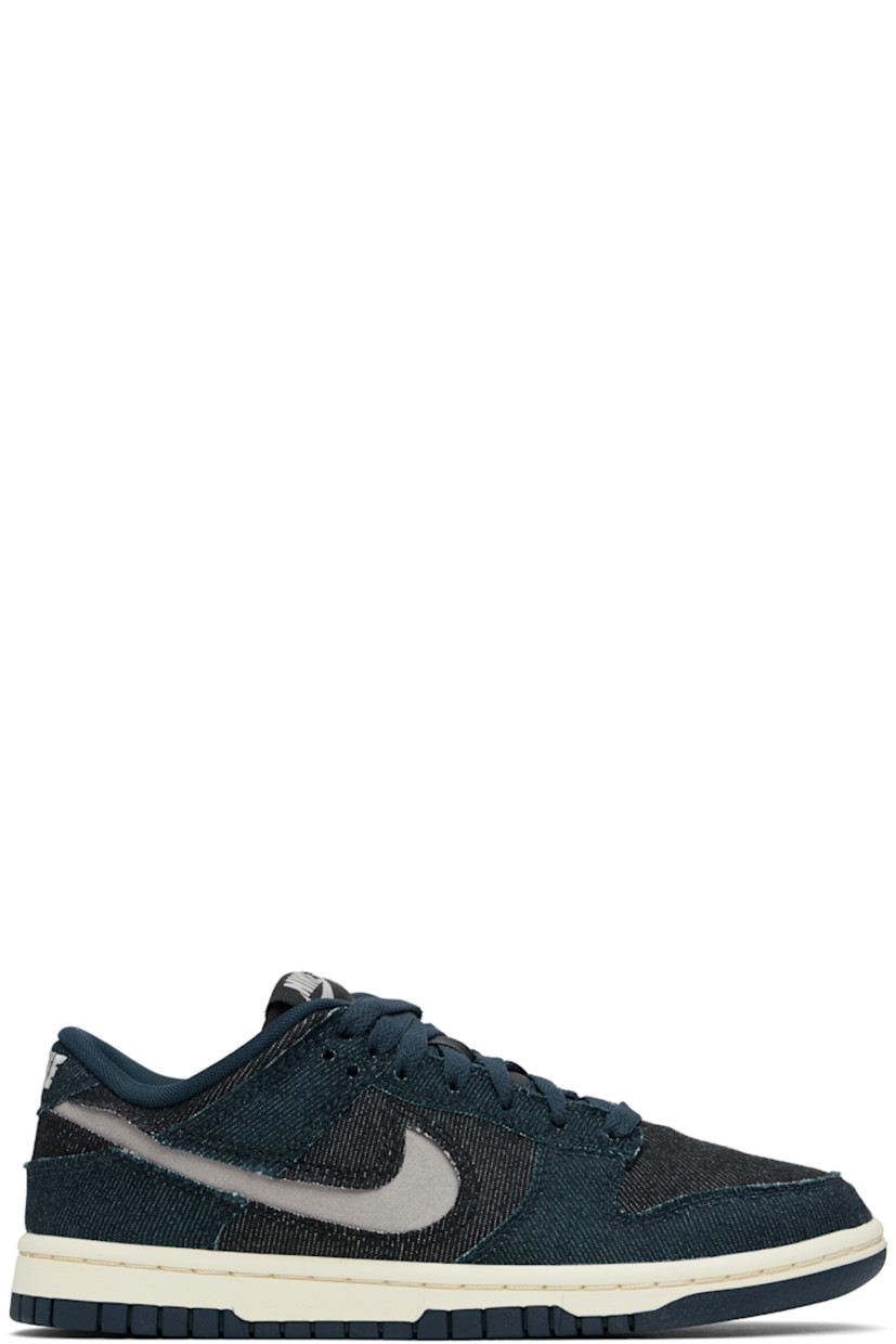 Low-top denim sneakers in navy and black.

· Lace-up closure
· Logo patch at padded tongue
· Padded collar
· Swoosh cutout at sides
· Logo embroidered at heel tab
· Mesh lining
· Treaded rubber sole

Please note that this item may be shipped only within North America.

Supplier color: Armory navy/College grey/ Black