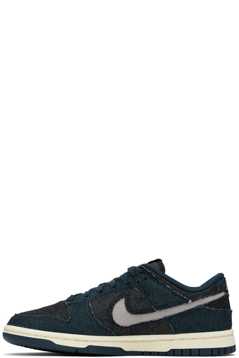 Low-top denim sneakers in navy and black.

· Lace-up closure
· Logo patch at padded tongue
· Padded collar
· Swoosh cutout at sides
· Logo embroidered at heel tab
· Mesh lining
· Treaded rubber sole

Please note that this item may be shipped only within North America.

Supplier color: Armory navy/College grey/ Black