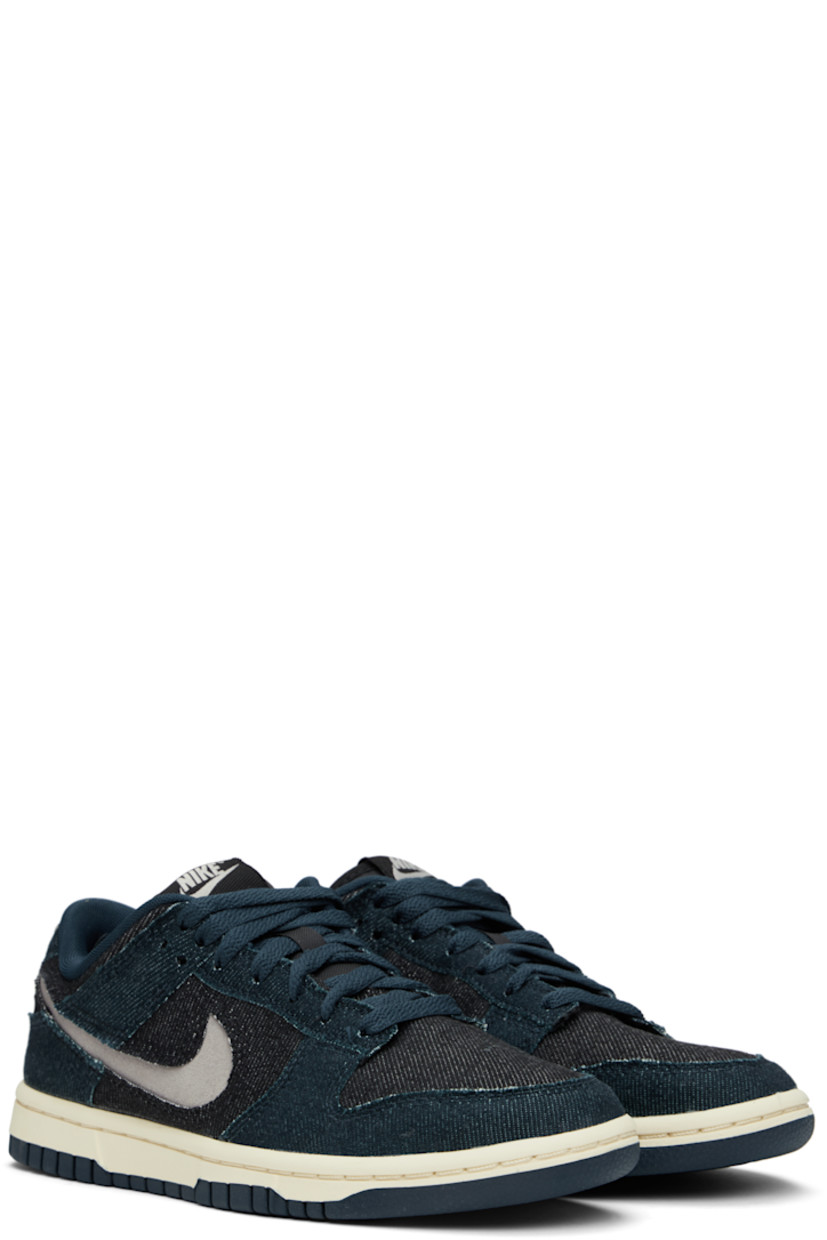 Low-top denim sneakers in navy and black.

· Lace-up closure
· Logo patch at padded tongue
· Padded collar
· Swoosh cutout at sides
· Logo embroidered at heel tab
· Mesh lining
· Treaded rubber sole

Please note that this item may be shipped only within North America.

Supplier color: Armory navy/College grey/ Black