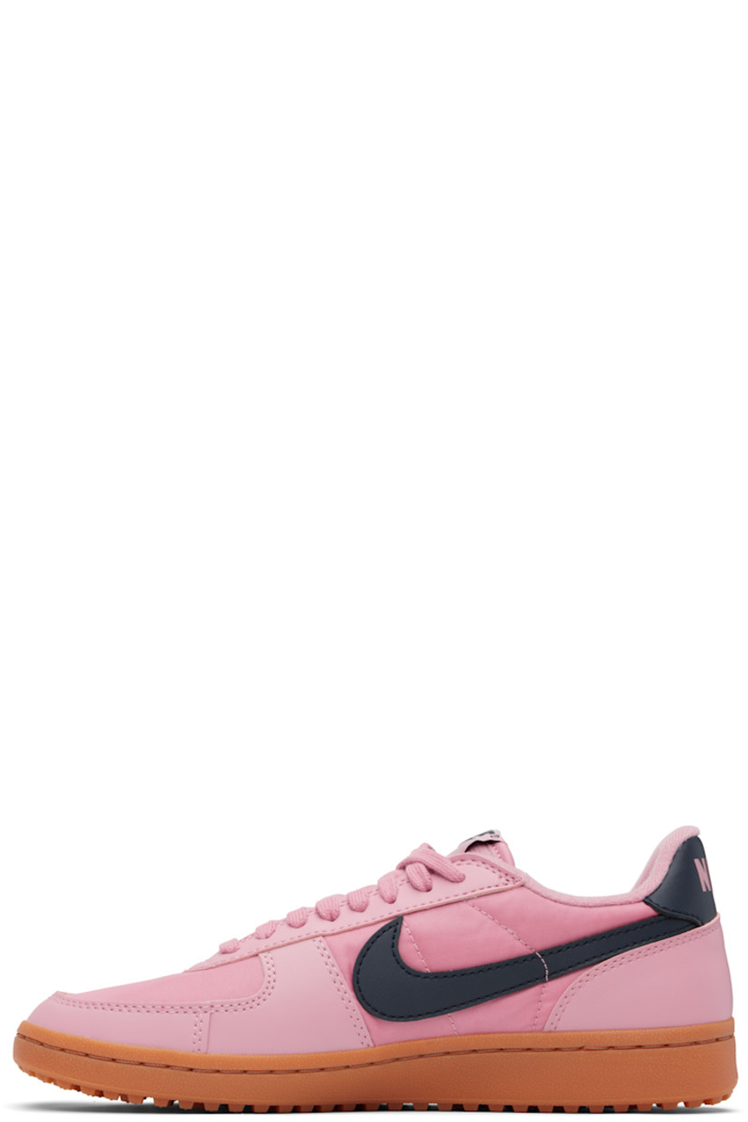 Low-top canvas and buffed faux-leather sneakers in pink.

· Lace-up closure
· Logo patch at padded tongue
· Padded collar
· Swoosh appliqué at sides
· Logo bonded at heel tab
· Jersey lining
· Cleated rubber sole

Please note that this item may be shipped only within North America.

Supplier color: Elemental pink/Gum medium brown/Obsidian