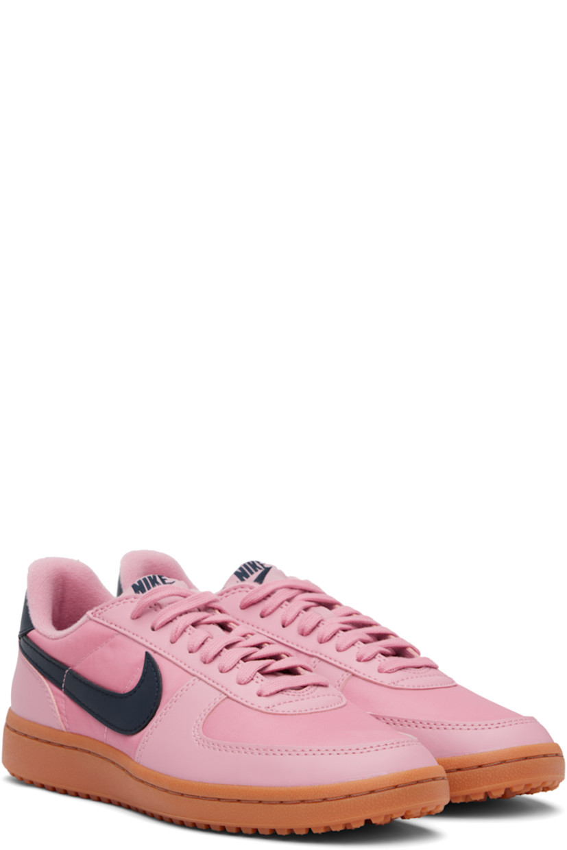 Low-top canvas and buffed faux-leather sneakers in pink.

· Lace-up closure
· Logo patch at padded tongue
· Padded collar
· Swoosh appliqué at sides
· Logo bonded at heel tab
· Jersey lining
· Cleated rubber sole

Please note that this item may be shipped only within North America.

Supplier color: Elemental pink/Gum medium brown/Obsidian