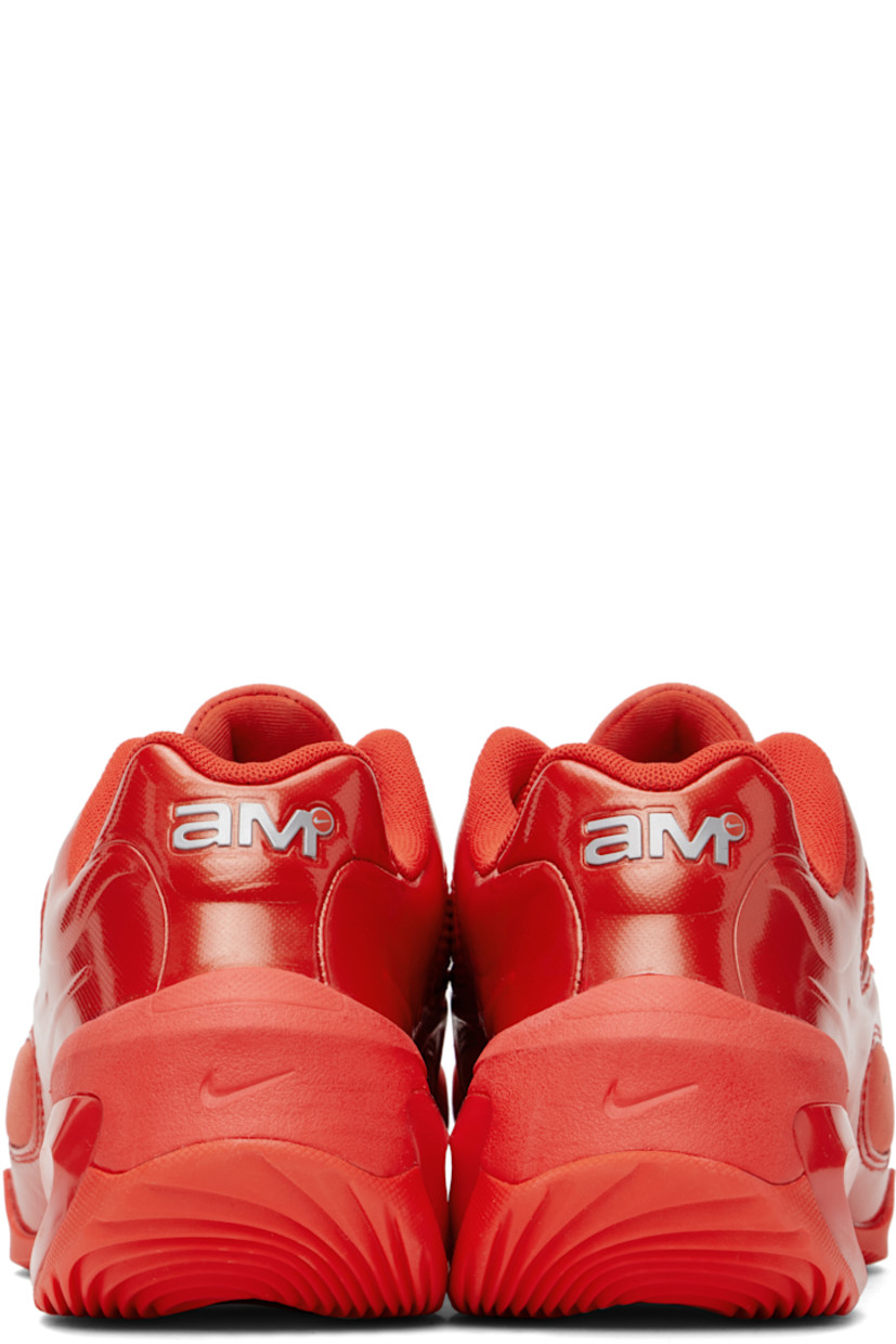 Low-top mesh, patent faux-leather, and faux-suede sneakers in red.

· Lace-up closure
· Logo bonded at padded tongue and heel tab
· Padded collar
· Silver-tone Swoosh appliqué at sides
· Air Max unit at foam rubber midsole
· Treaded rubber sole

Please note that this item may be shipped only within North America.

Supplier color: Habanero red/Pure platinum/Metallic silver