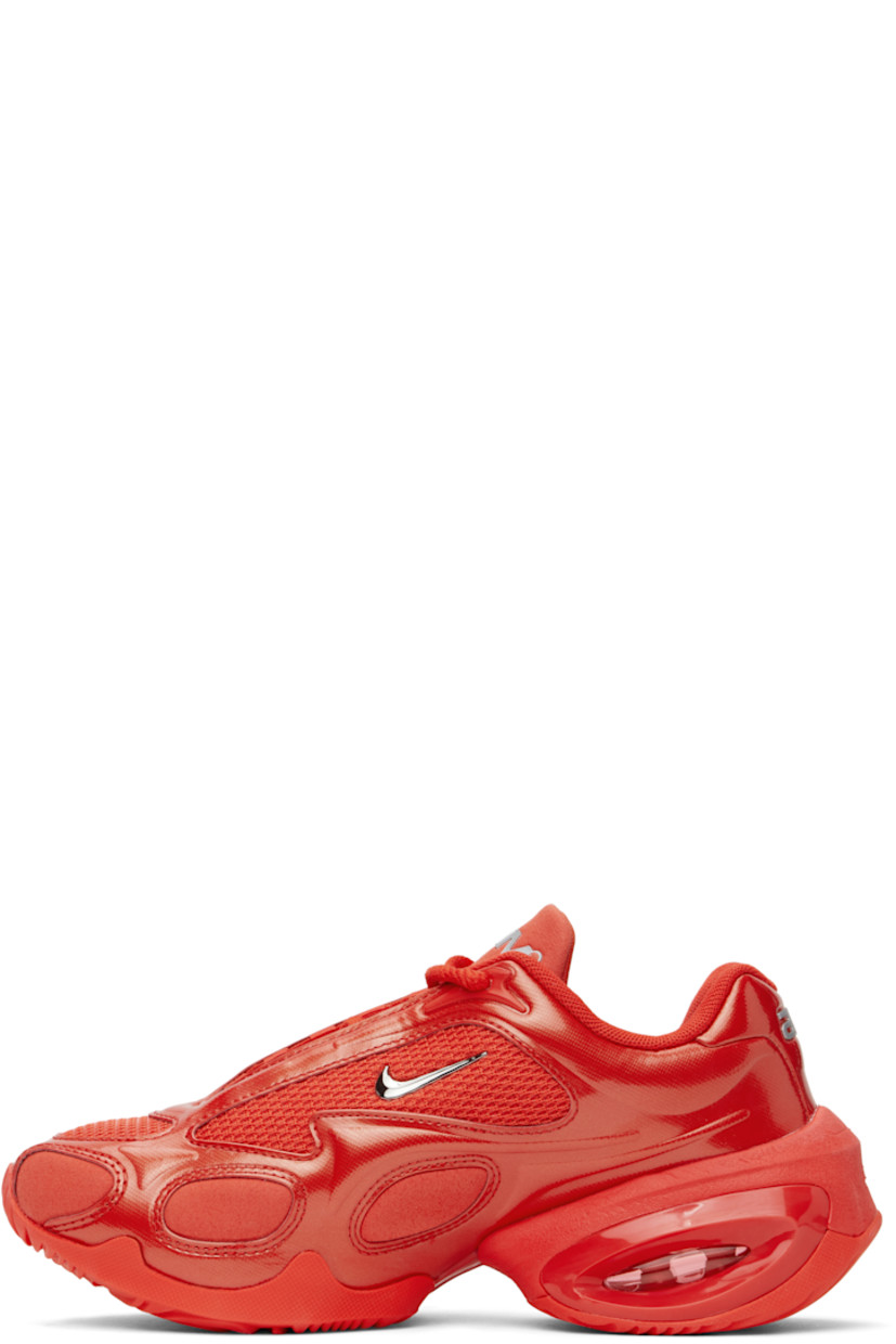 Low-top mesh, patent faux-leather, and faux-suede sneakers in red.

· Lace-up closure
· Logo bonded at padded tongue and heel tab
· Padded collar
· Silver-tone Swoosh appliqué at sides
· Air Max unit at foam rubber midsole
· Treaded rubber sole

Please note that this item may be shipped only within North America.

Supplier color: Habanero red/Pure platinum/Metallic silver