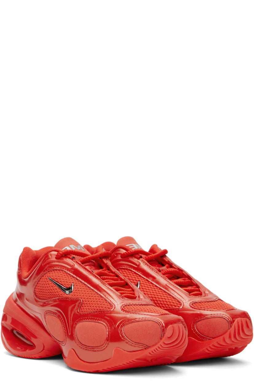 Low-top mesh, patent faux-leather, and faux-suede sneakers in red.

· Lace-up closure
· Logo bonded at padded tongue and heel tab
· Padded collar
· Silver-tone Swoosh appliqué at sides
· Air Max unit at foam rubber midsole
· Treaded rubber sole

Please note that this item may be shipped only within North America.

Supplier color: Habanero red/Pure platinum/Metallic silver