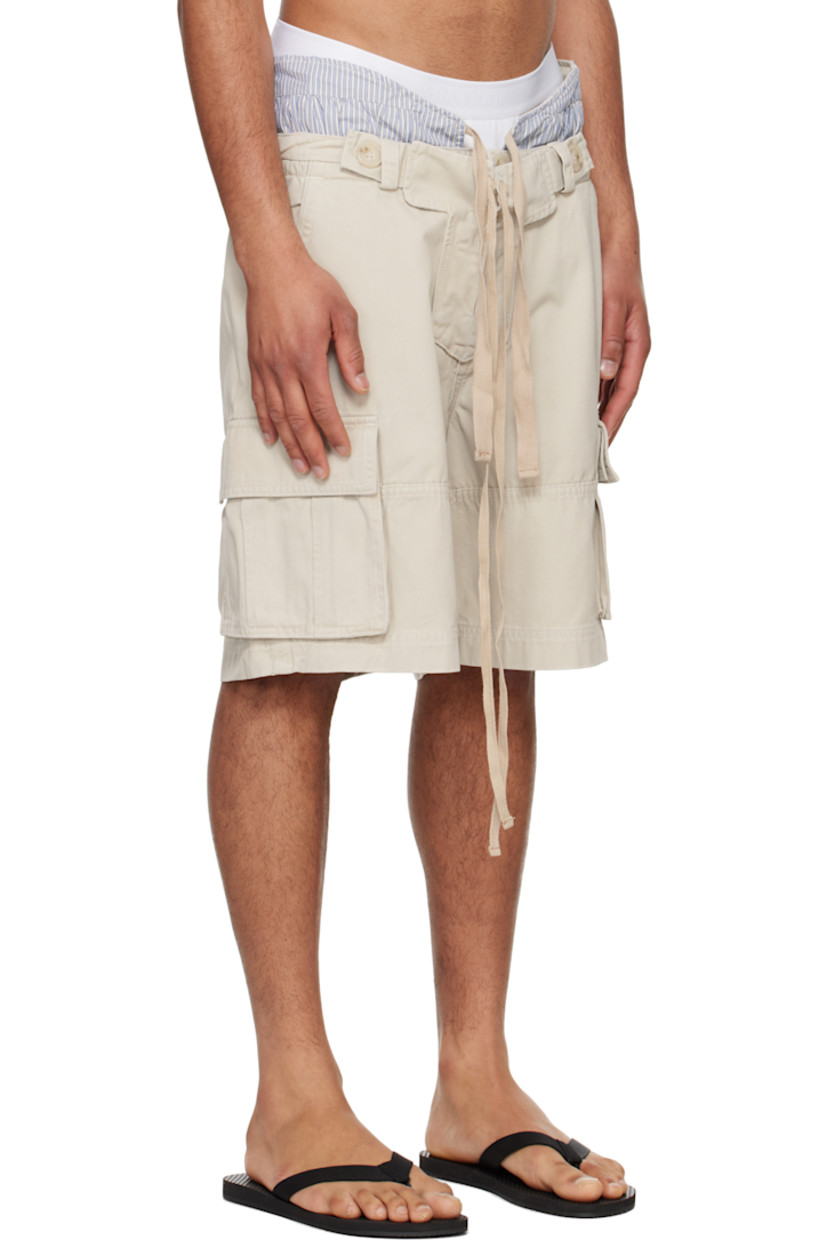 Cotton twill shorts. Drawstring and adjustable button tabs at layered waistband.
 
· Stripes at waistband
· Belt loops
· Four-pocket styling 
· Zip fly and exposed lace-up fly
· Cargo pocket at outseams

Supplier color: Stone/Stripe