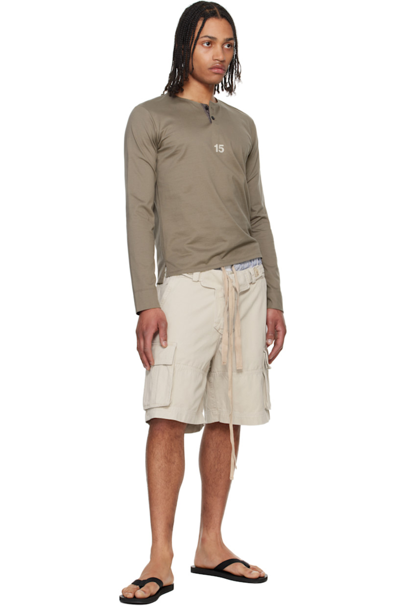 Cotton twill shorts. Drawstring and adjustable button tabs at layered waistband.
 
· Stripes at waistband
· Belt loops
· Four-pocket styling 
· Zip fly and exposed lace-up fly
· Cargo pocket at outseams

Supplier color: Stone/Stripe