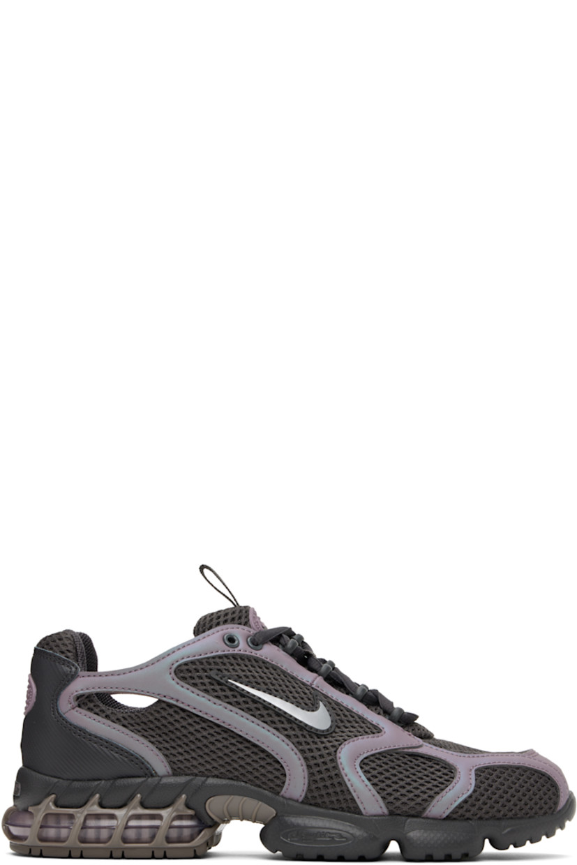 Low-top mesh and buffed faux-leather sneakers in gray and iridescent taupe.

· Lace-up closure
· Logo patch and pull-loop at padded tongue
· Padded collar
· Swoosh appliqué at sides
· Logo patch at heel counter
· Mesh lining
· Air Zoom unit at treaded rubber sole

Please note that this item may be shipped only within North America.

Supplier color: Medium ash/Taupe grey/Cave stone/Metallic silver