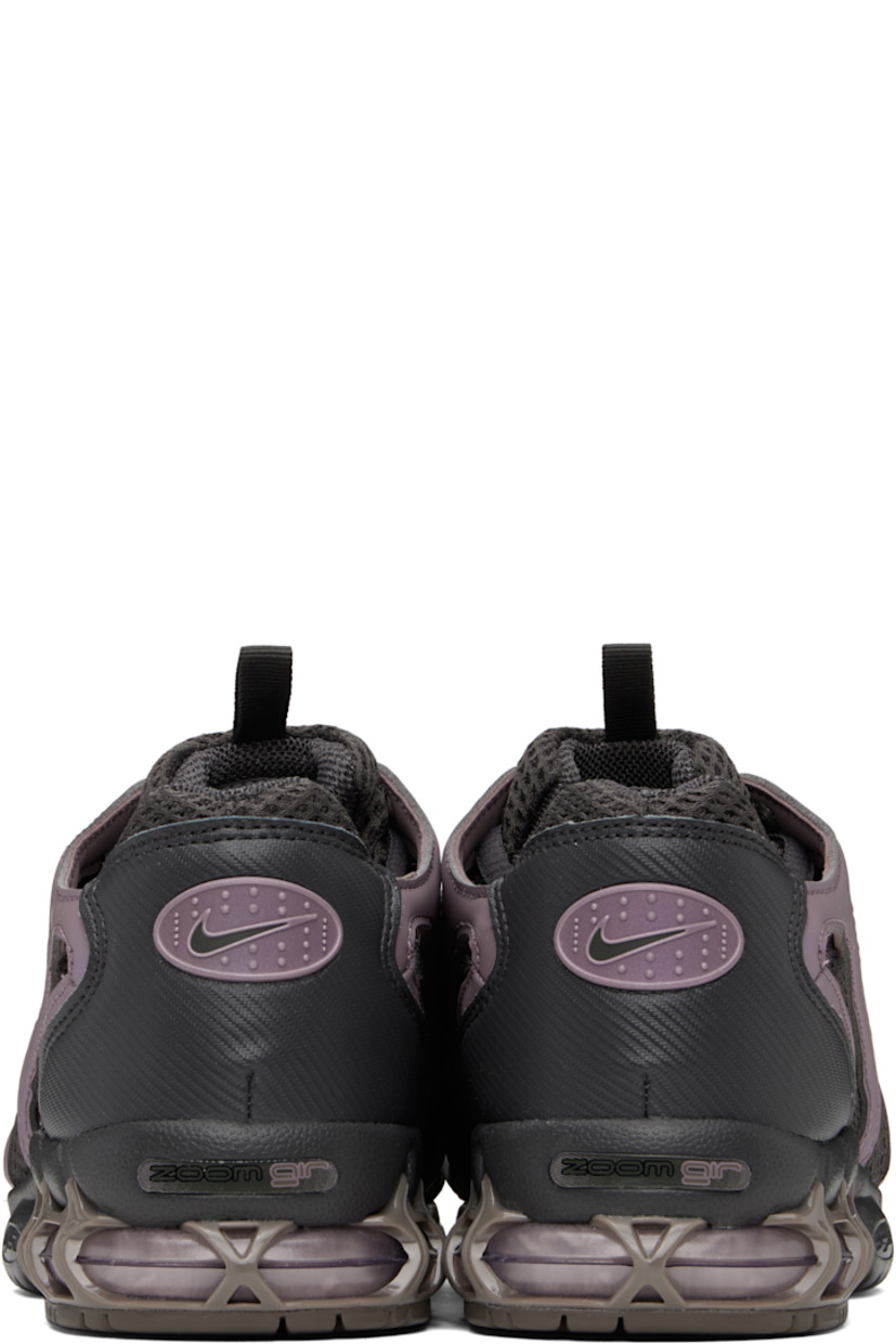 Low-top mesh and buffed faux-leather sneakers in gray and iridescent taupe.

· Lace-up closure
· Logo patch and pull-loop at padded tongue
· Padded collar
· Swoosh appliqué at sides
· Logo patch at heel counter
· Mesh lining
· Air Zoom unit at treaded rubber sole

Please note that this item may be shipped only within North America.

Supplier color: Medium ash/Taupe grey/Cave stone/Metallic silver