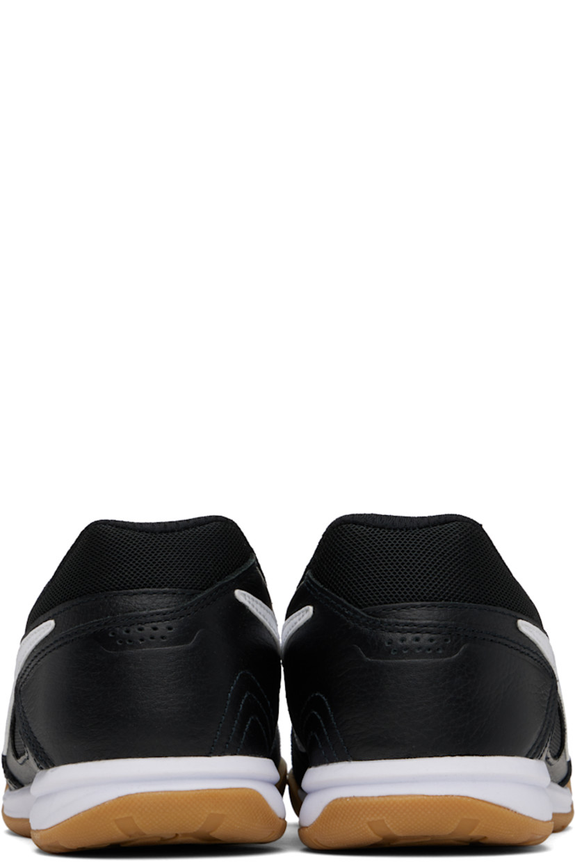 Low-top grained leather and canvas sneakers in black.

· Suede trim at toe
· Lace-up closure
· Logo patch at padded tongue
· Padded collar
· Swoosh appliqué at sides
· Mesh lining
· Treaded rubber sole

Please note that this item may be shipped only within North America.

Supplier color: Black/Gum light brown/White
