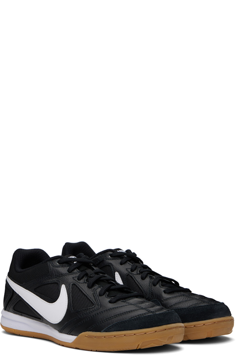 Low-top grained leather and canvas sneakers in black.

· Suede trim at toe
· Lace-up closure
· Logo patch at padded tongue
· Padded collar
· Swoosh appliqué at sides
· Mesh lining
· Treaded rubber sole

Please note that this item may be shipped only within North America.

Supplier color: Black/Gum light brown/White