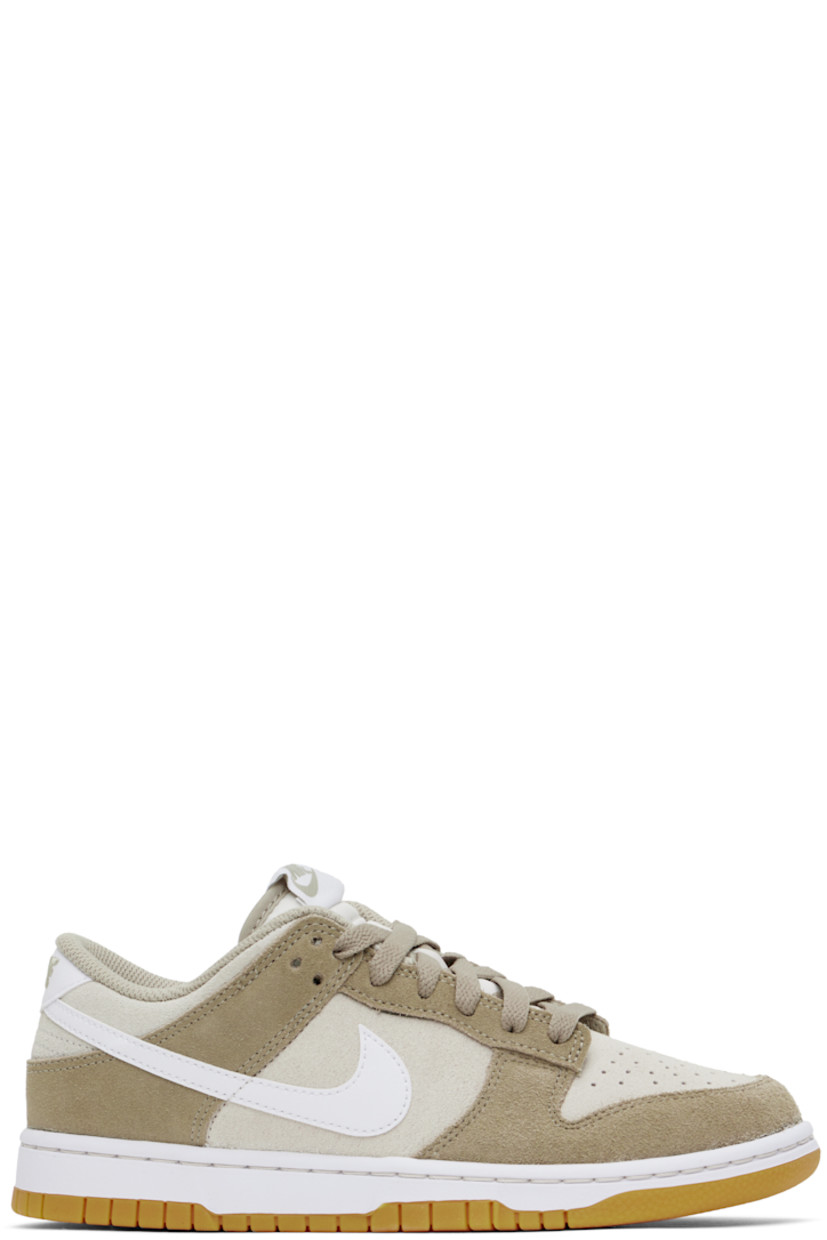 Low-top suede sneakers in beige.

· Perforated detailing at toe
· Lace-up closure 
· Logo patch at padded tongue
· Padded collar
· Swoosh appliqué at sides
· Logo embroidered at heel tab
· Mesh lining
· Treaded rubber sole
· Includes alternate laces in white

Please note that this item may be shipped only within North America.

Supplier color: Pale ivory/Light orewood brown/Gum light brown/White