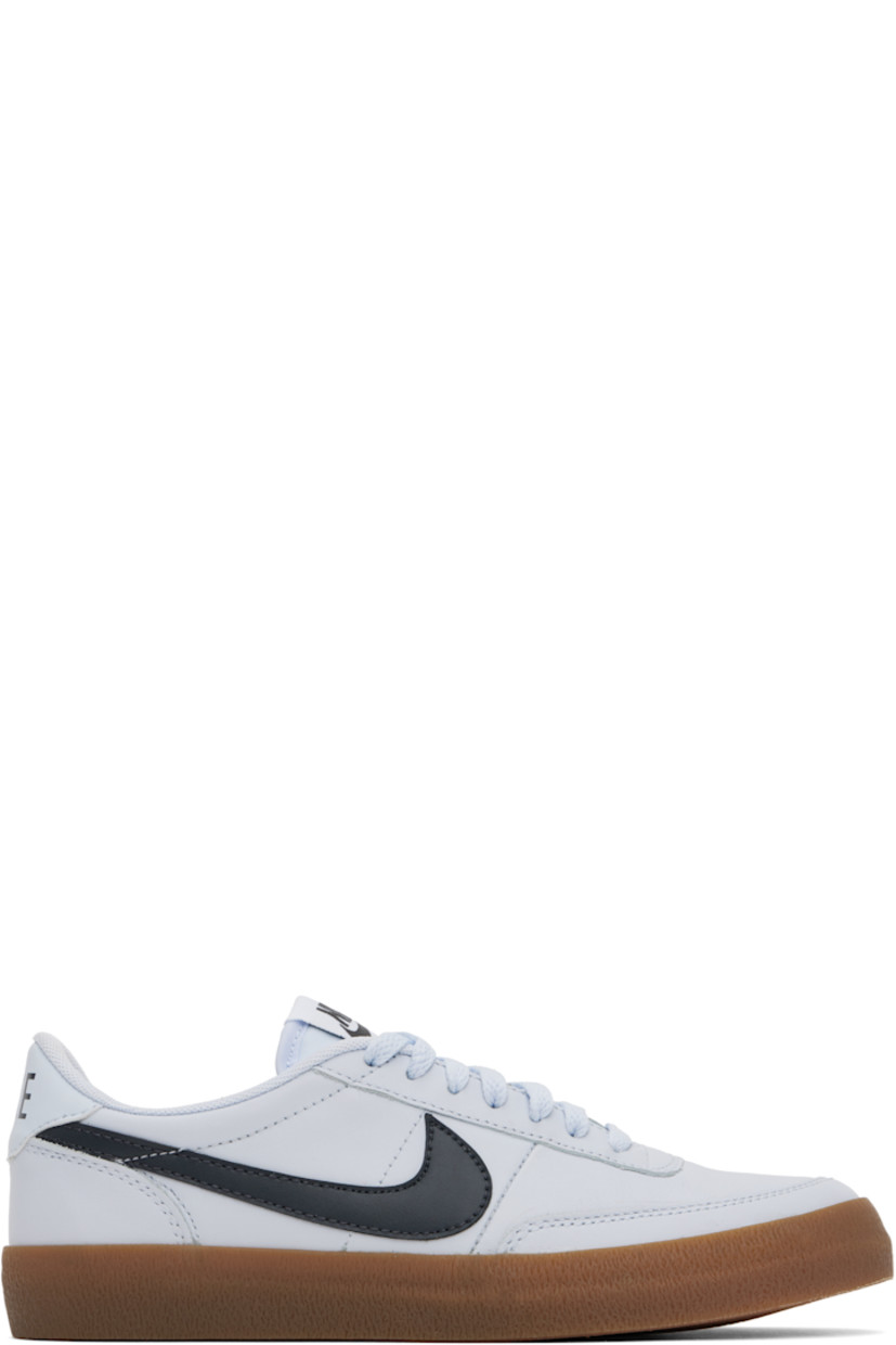 Low-top buffed leather sneakers in gray.

· Lace-up closure
· Logo patch at padded tongue
· Padded collar
· Swoosh appliqué at sides
· Logo printed at heel tab
· Mesh lining
· Treaded rubber sole

Please note that this item may be shipped only within North America.

Supplier color: Football grey/Gum medium brown/White